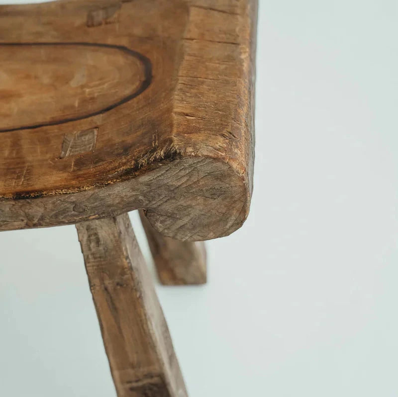 Alvarez Bench Seat in Brown suar wood, three hand-carved scooped seats on angled timber legs, shown against a plain backdrop.