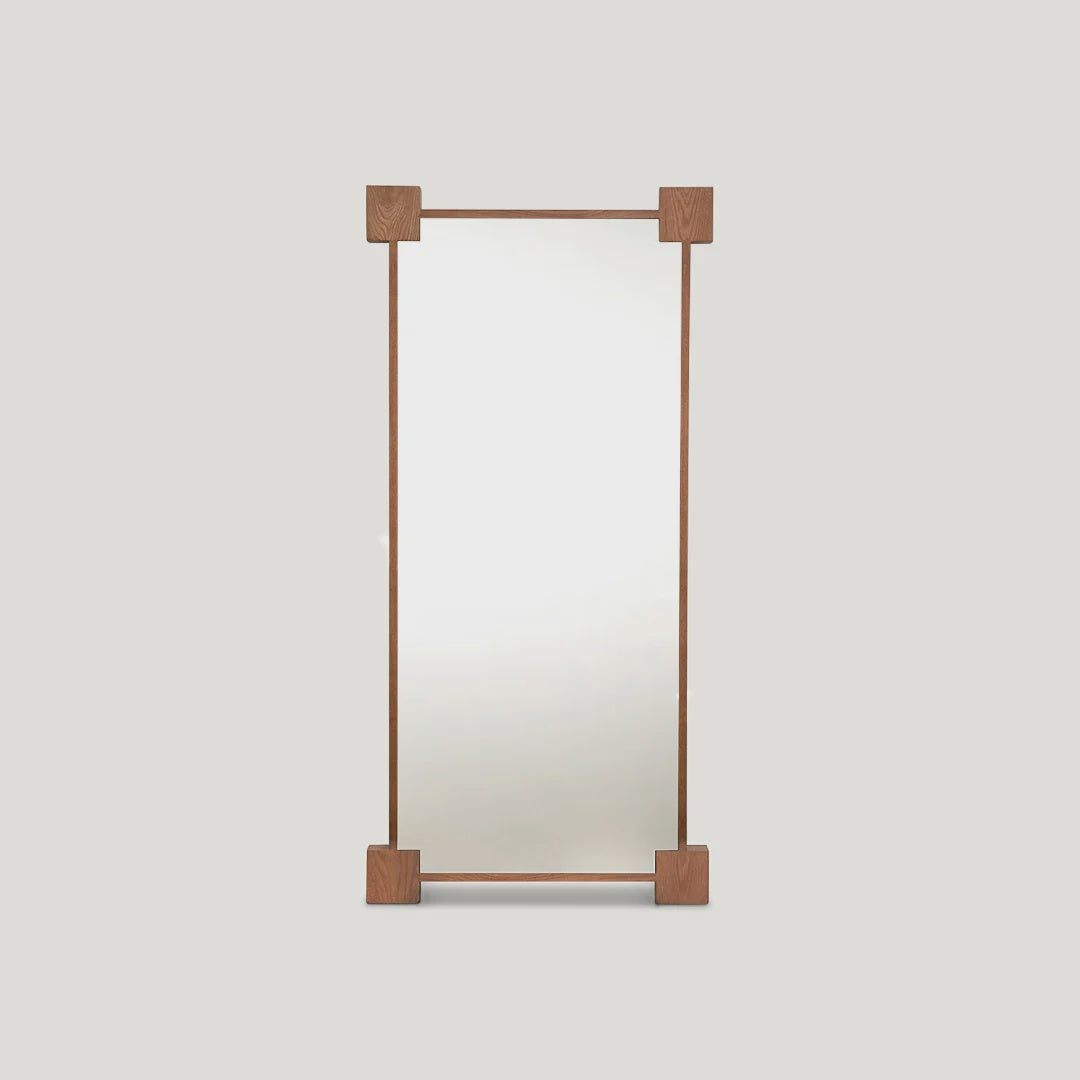 August Mirror in solid American Oak with architectural corner-block frame. A warm, structured piece for the hallway or living space.