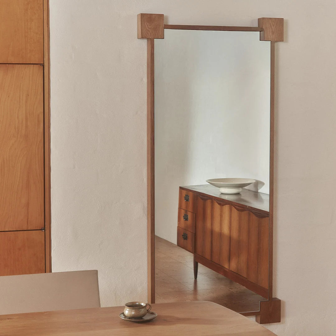 August Mirror in solid American Oak with architectural corner-block frame. A warm, structured piece for the hallway or living space.