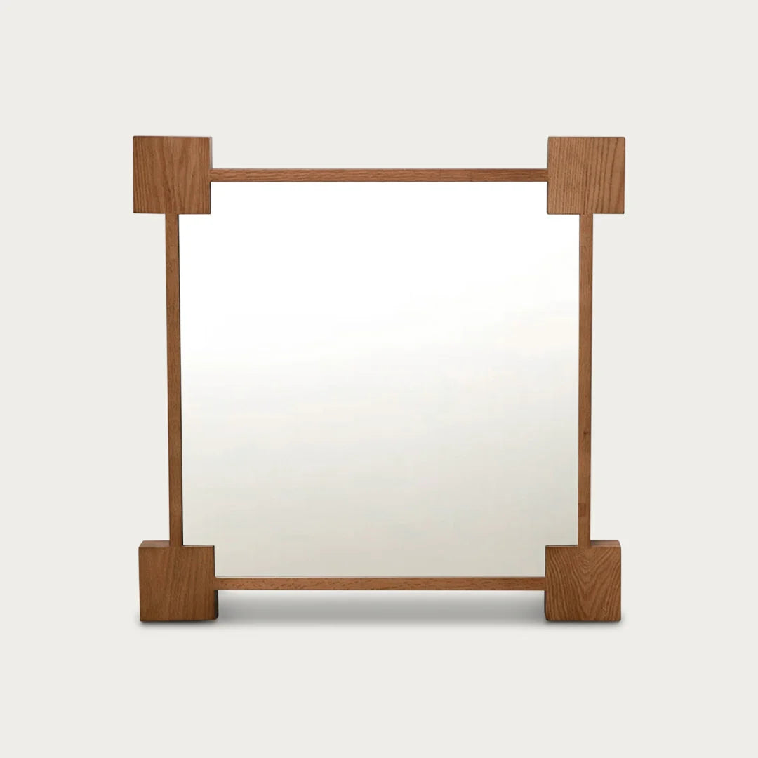 August Mirror in solid American Oak with architectural corner-block frame. A warm, structured piece for the hallway or living space.