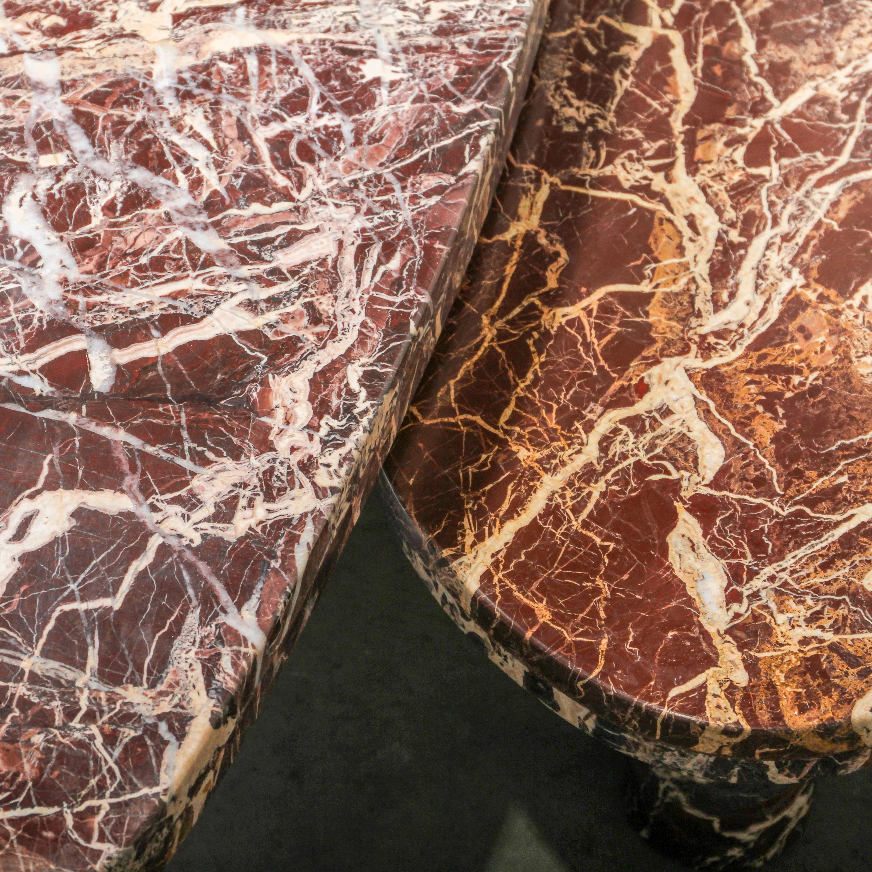 Cameo Stone Coffee Table in Cherry marble, rounded organic top on three column legs.