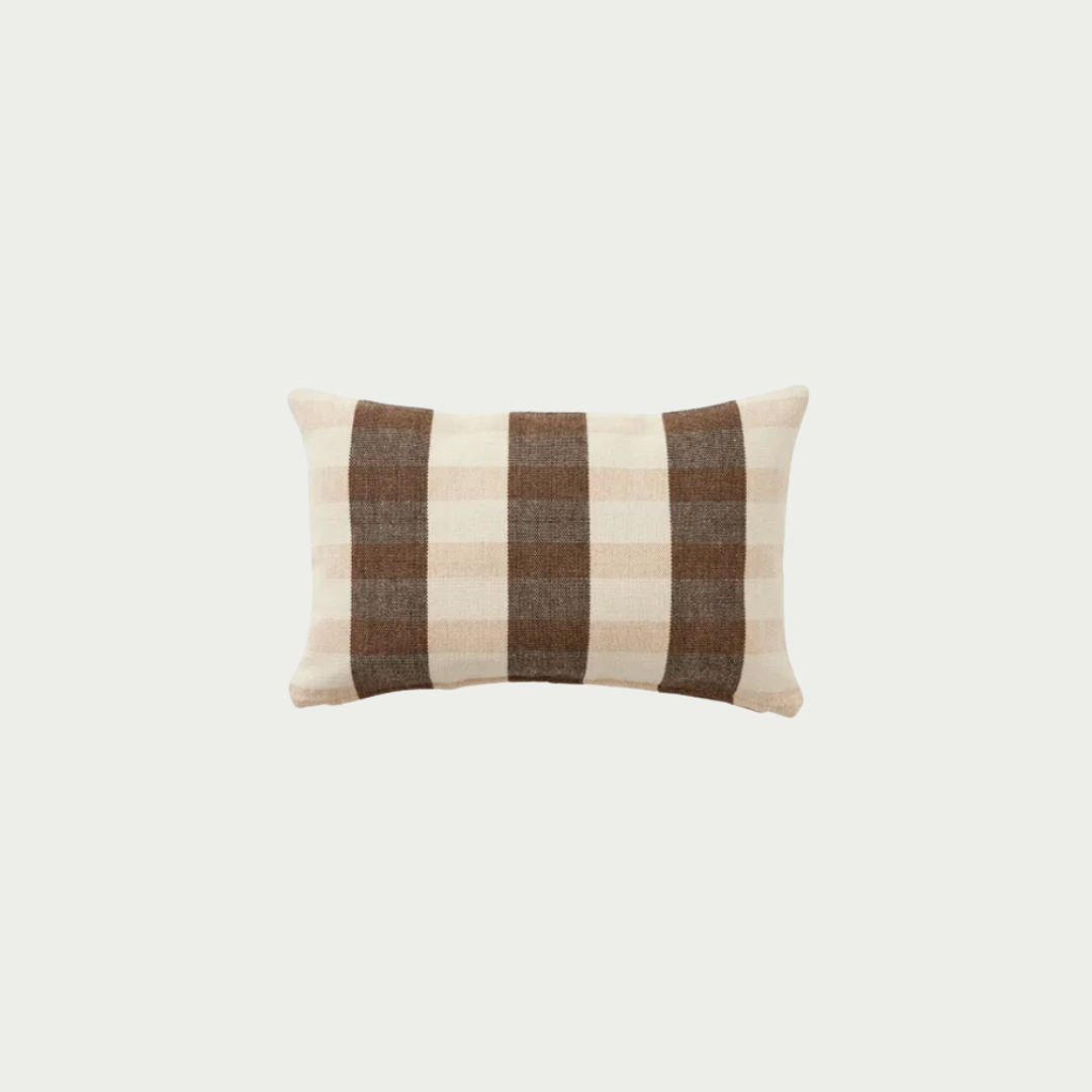 Chocolate and cream check lumbar cushion styled on a neutral sofa — Good Huis Co Geelong