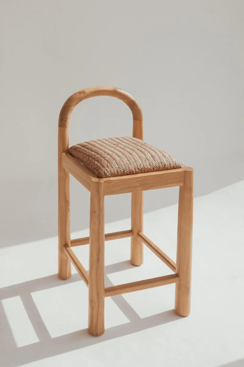 Desa Bar Stool in Light Natural teak, arched backrest with hand-woven Desa pattern seat.
