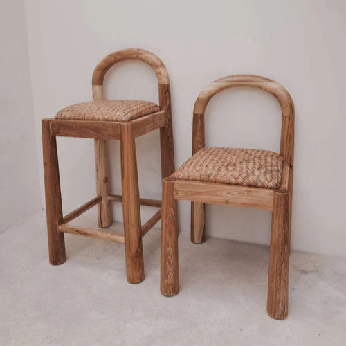 Desa Dining Chair and Bar Stool in natural teak, arched backrest with hand-woven Desa pattern seat.