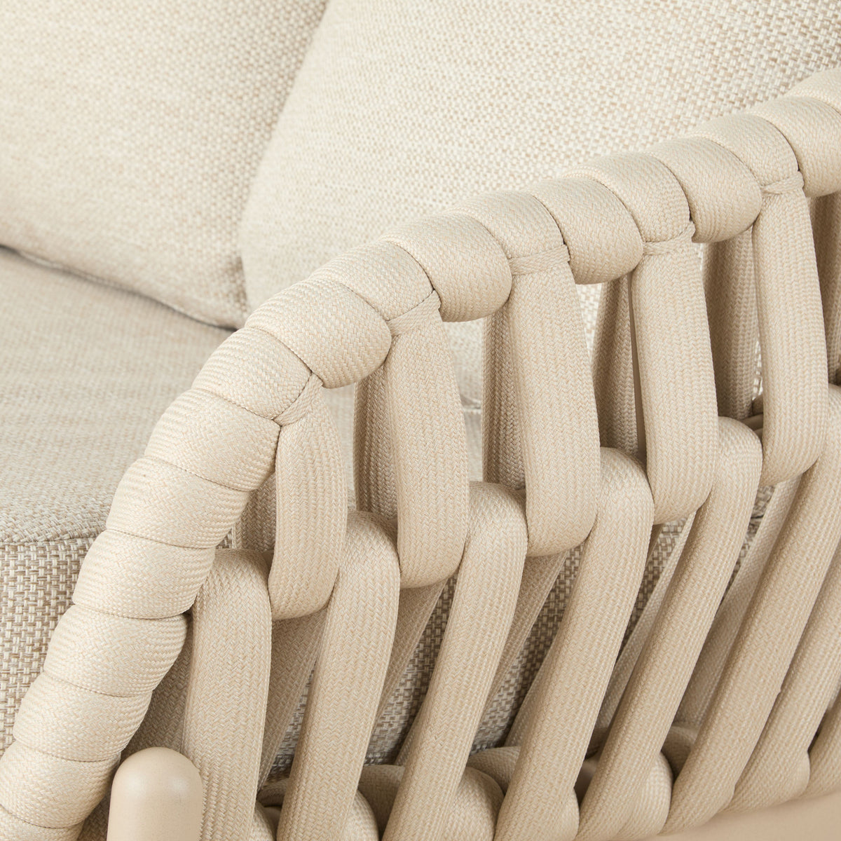 Elwood Outdoor 3 Seater Sofa in Beige, woven polyester rope frame with cushioned seating, styled on a white background.