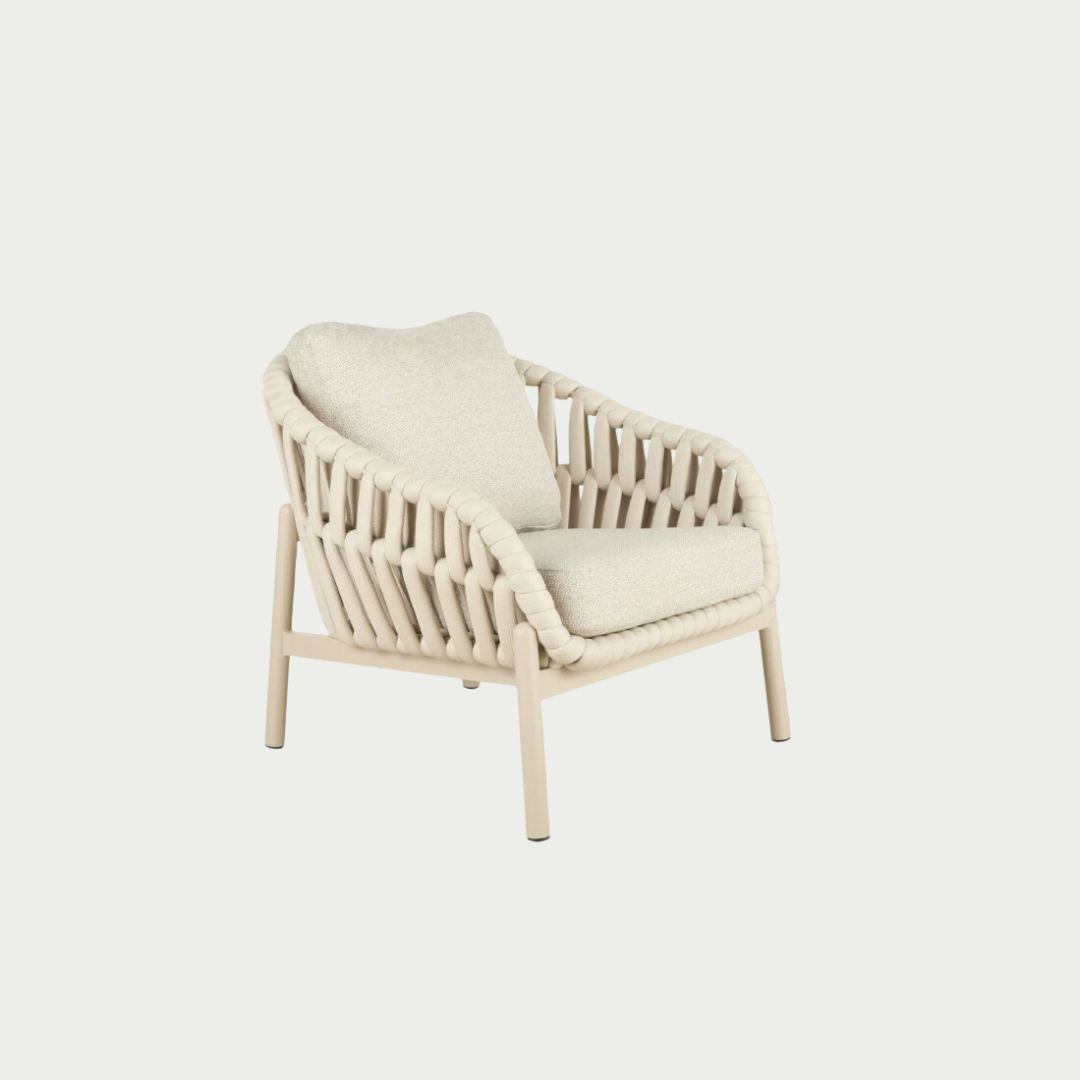 Elwood Outdoor Chair in Beige, woven polyester rope frame with cushioned seat, styled on a white background.