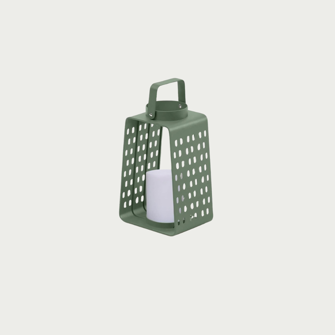 A green Para camping light with a perforated pattern and an integrated LED lamp.