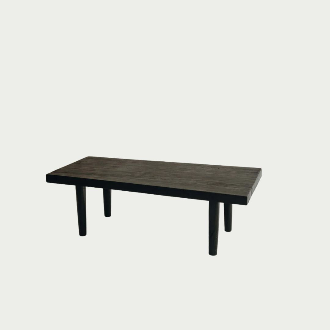 Hugo Coffee Table in Walnut, rectangular timber top on tapered legs, shown on a white background.