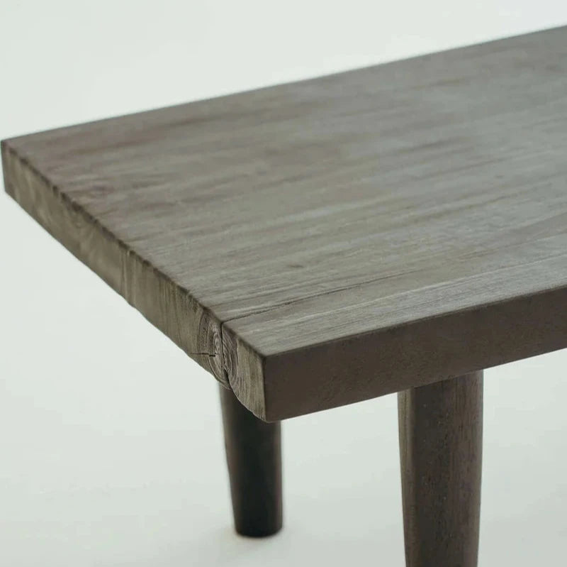 Hugo Coffee Table in Walnut, rectangular timber top on tapered legs, shown on a white background.
