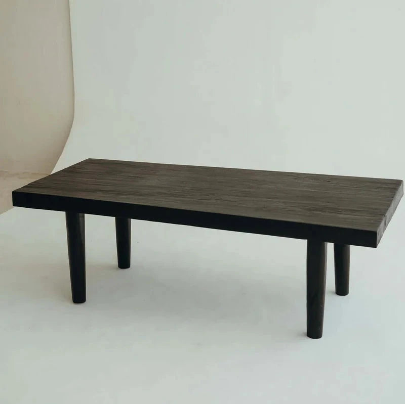 Hugo Coffee Table in Walnut, rectangular timber top on tapered legs, shown on a white background.