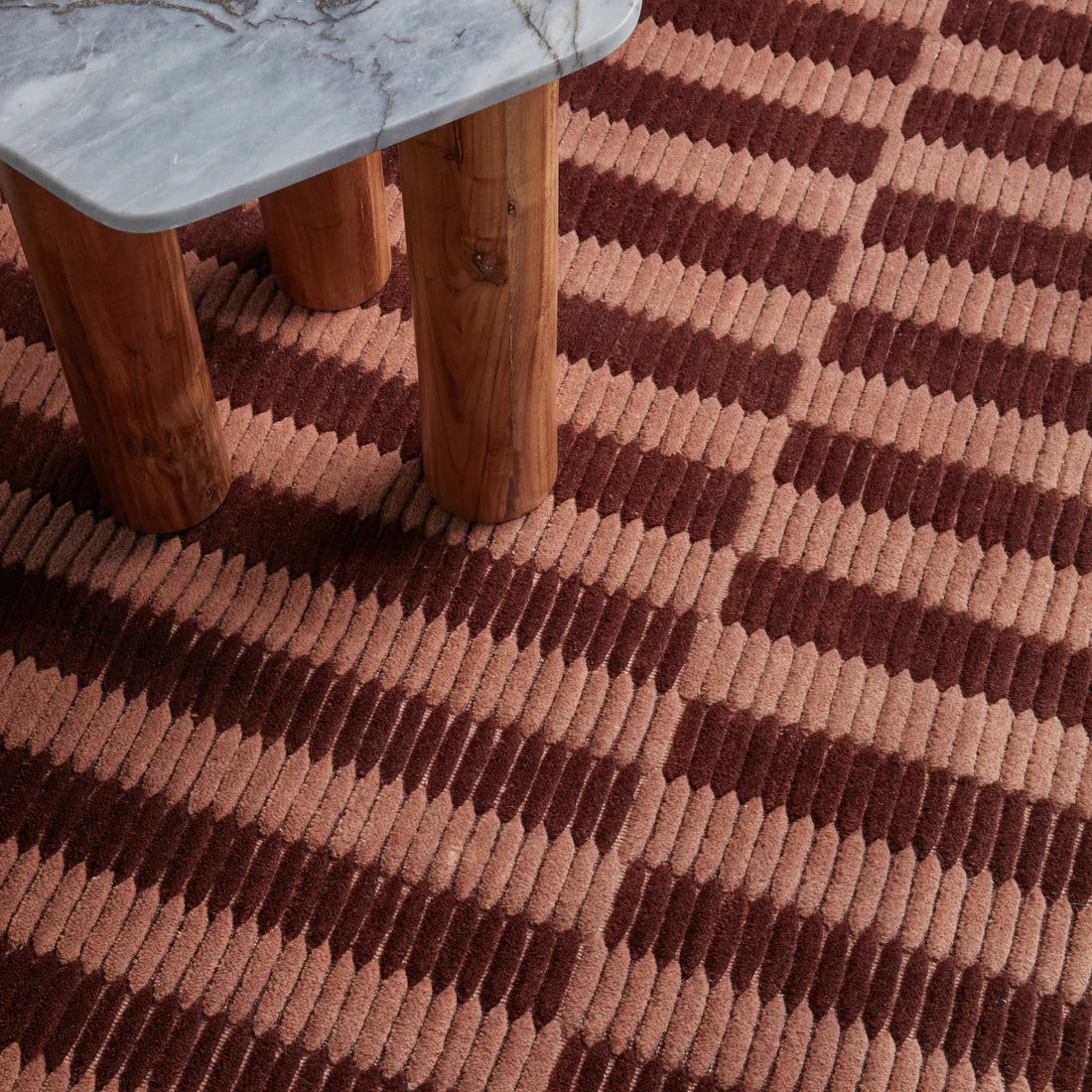 Terra Linea wool rug in a rich rusted red — handloomed textural detail, Elan & Earth at Good Huis Co Geelong