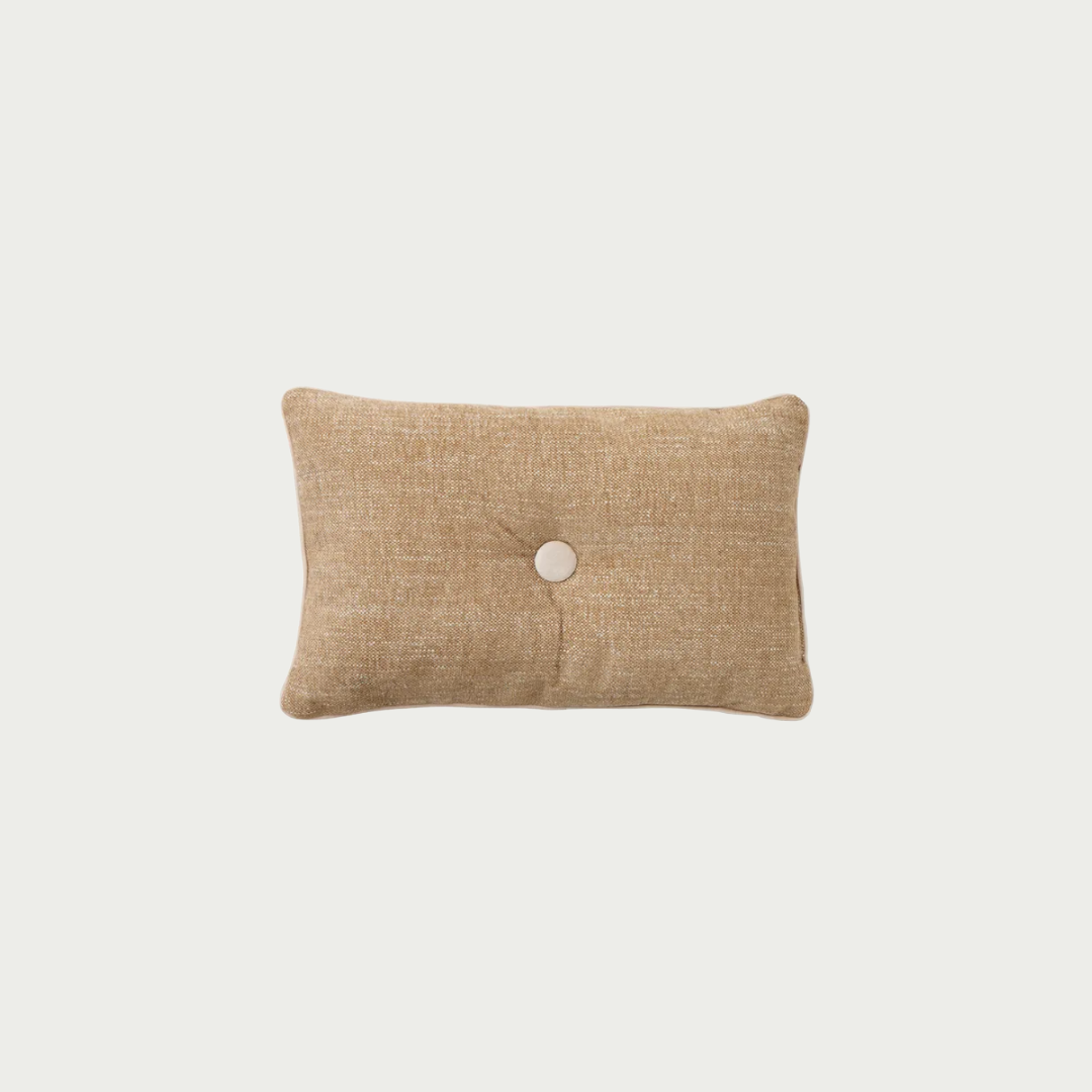 Lumbar cushion in neutral tones with velvet centre detail from Good Huis Co Geelong. styled with neutral armchair