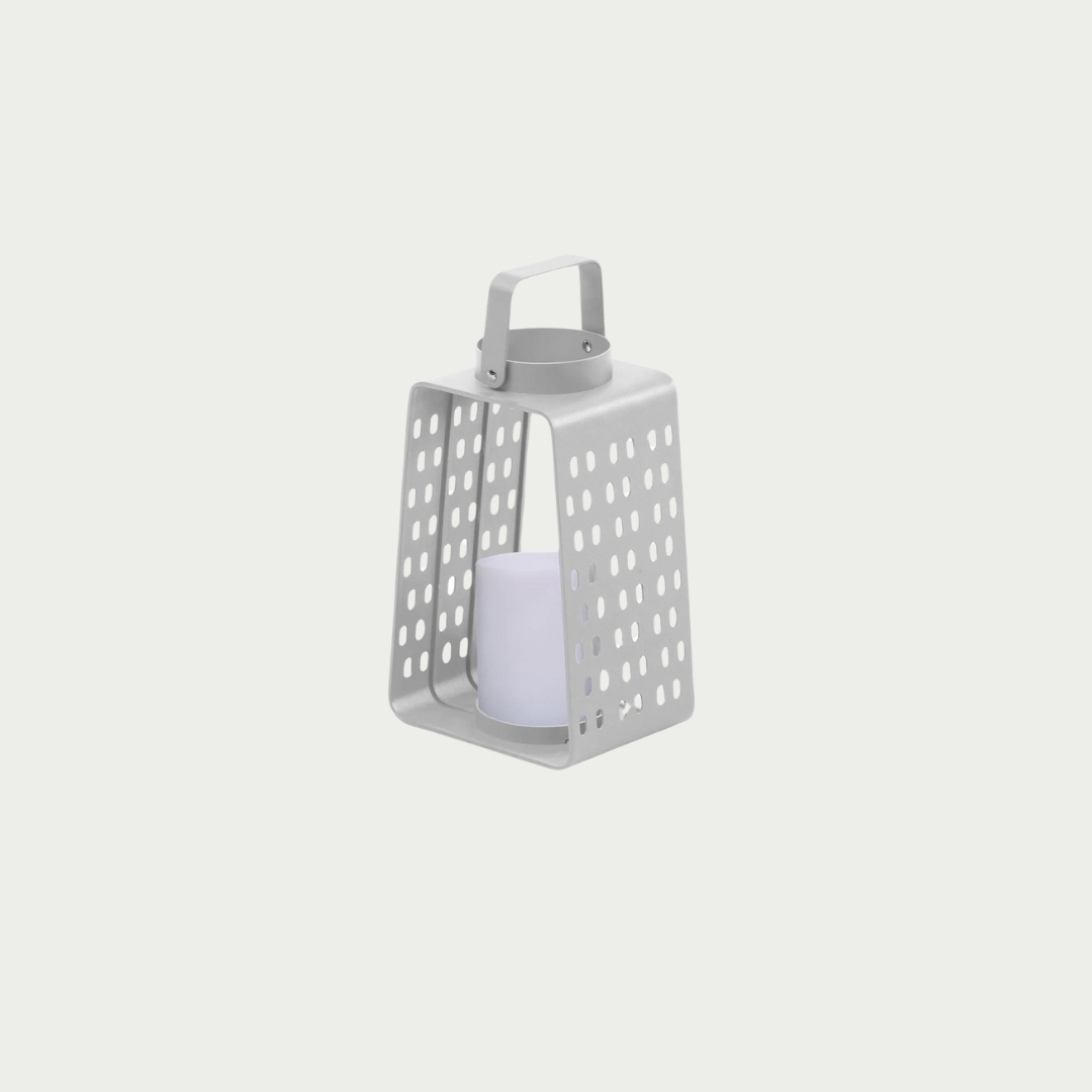 White Para light with a perforated pattern and a cylindrical LED-powered lamp.