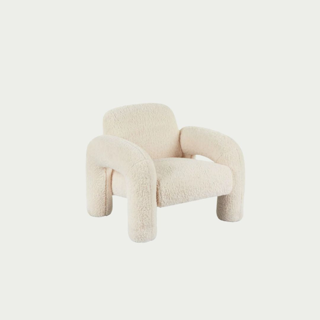 Mia Armchair in off-white bouclé, chunky sculptural silhouette with rounded oversized arms.