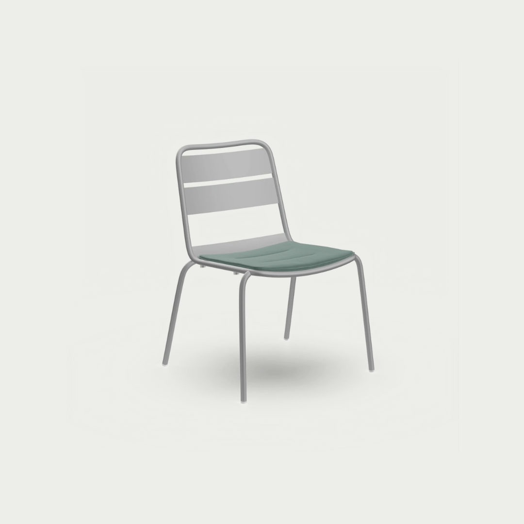 Chair with metal frame and green cushion on a white background