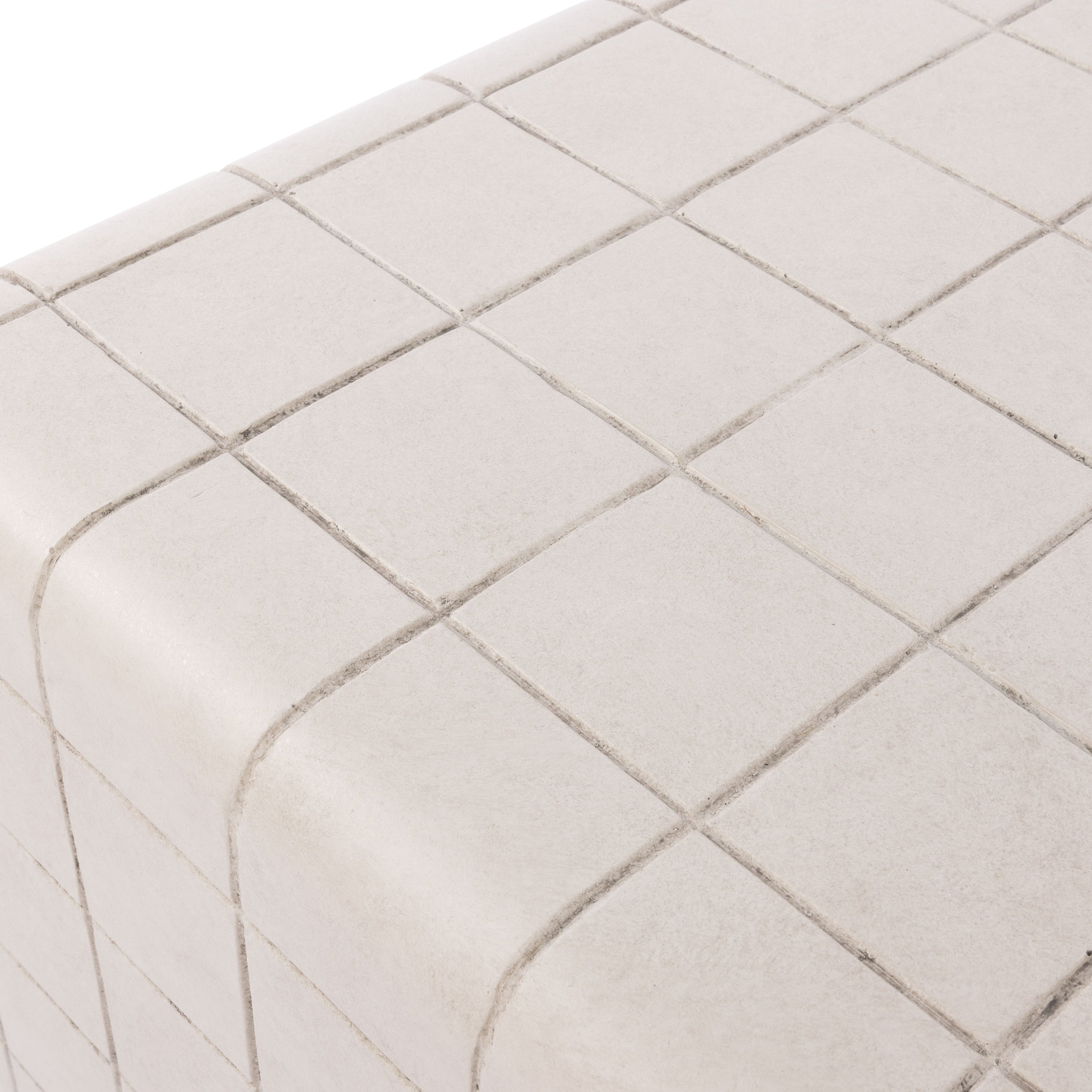 Tile Effect coffee table in Oat, chunky architectural form with an all-over tiled texture, shown on a white background.