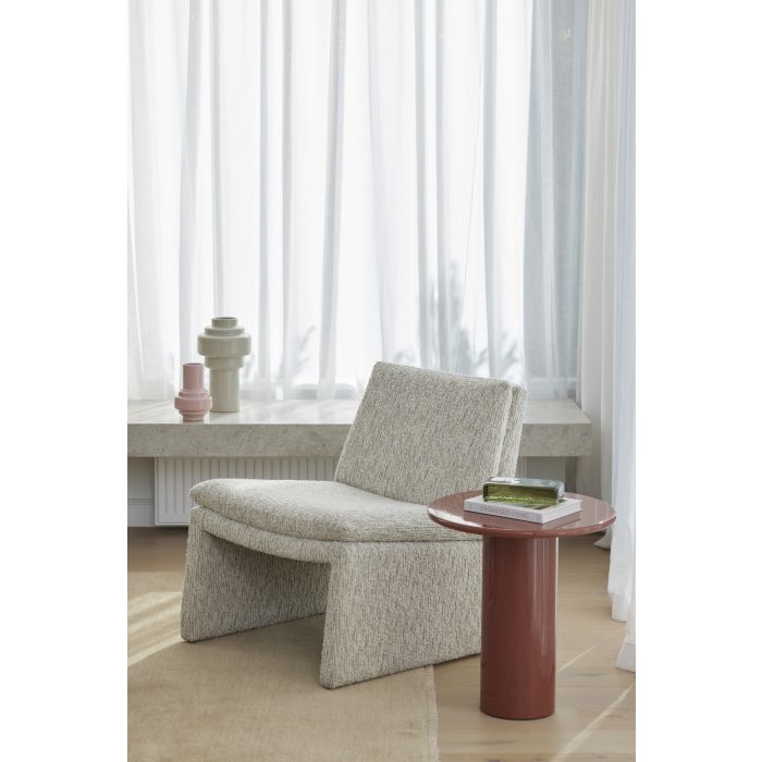 Wade Side Table in Hot Pink, round tabletop on a chunky cylindrical leg with a high-gloss finish, styled in a lounge setting.