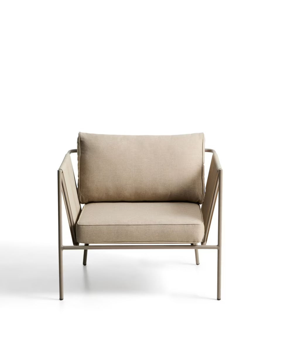Beige armchair with metal frame on a white background