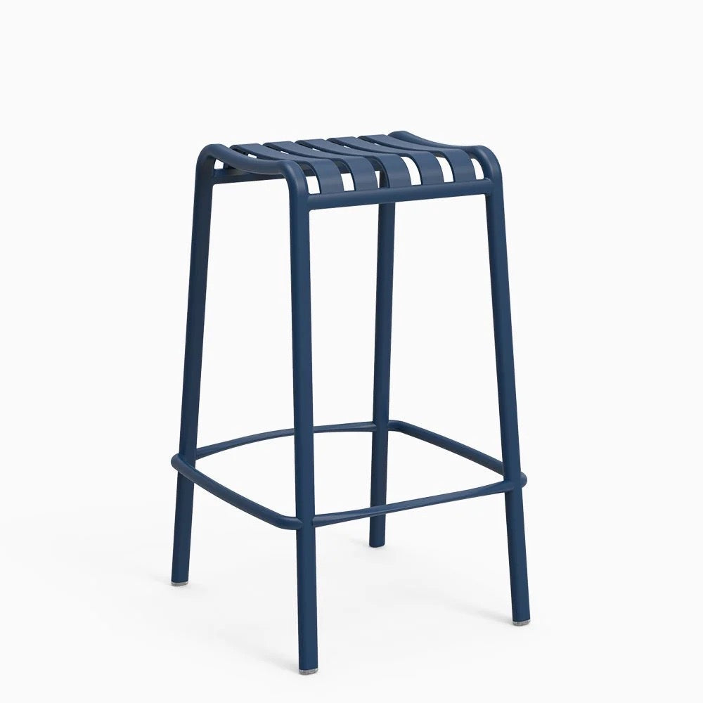 A blue backless stool with a lightweight aluminum frame and a natural textured finish.