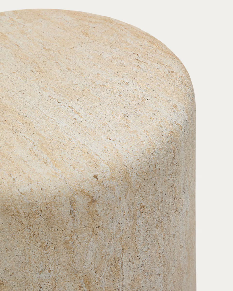 Close-up of a beige stone surface with natural variations