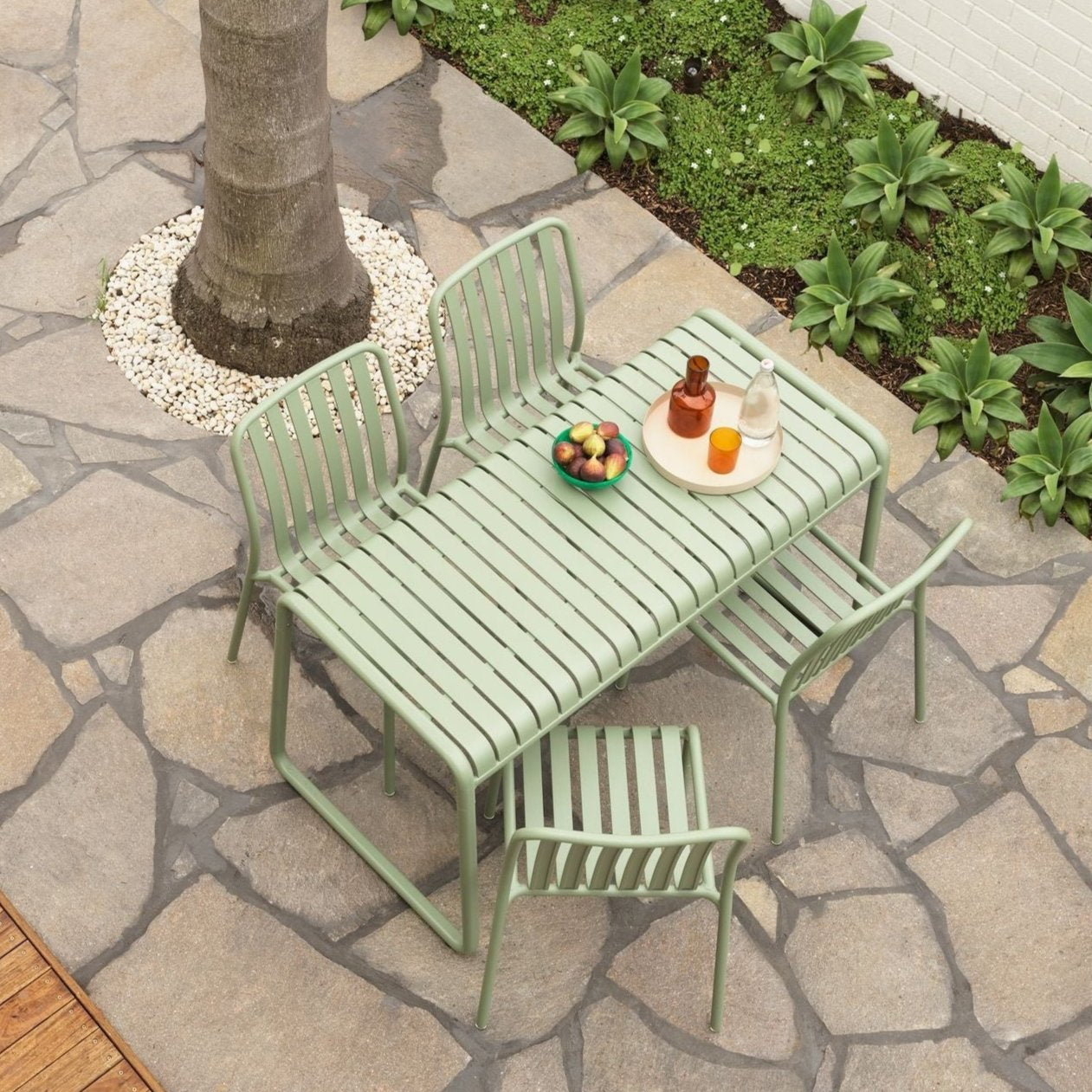 green outdoor dining setting 