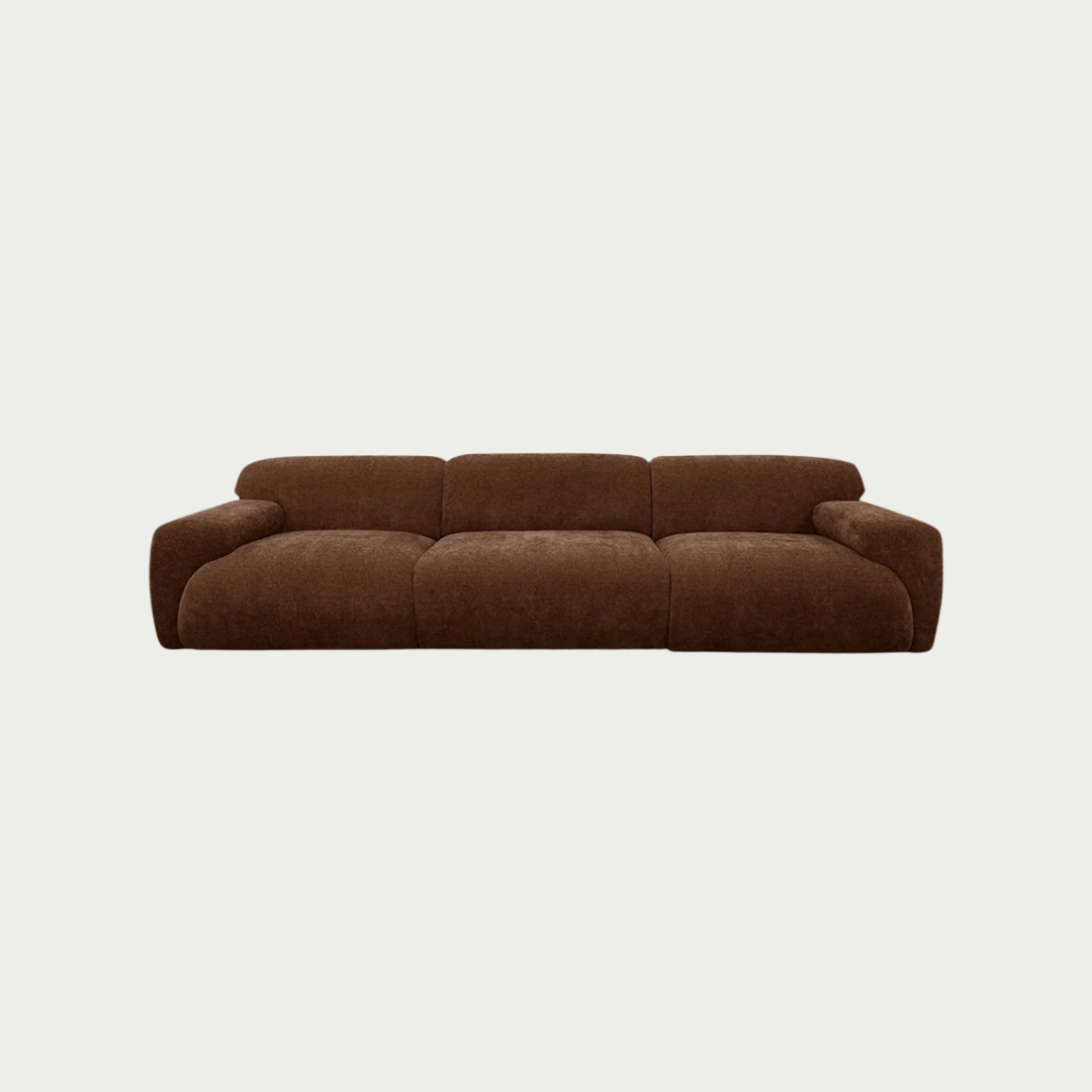A low-profile three-seater sofa upholstered in a textured brown fabric, shown against a solid off-white background.