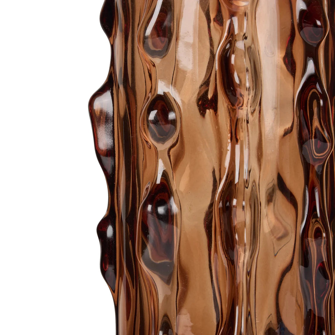 close up of textured brown glass vase